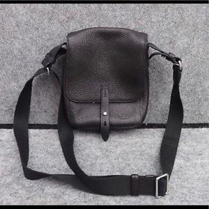 Tumi leather cross body